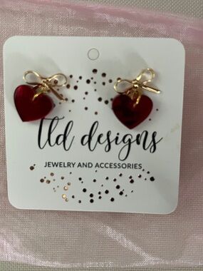 LTD Designs Red Heart Earrings with Gold Bow Accents.  Original packaging and ba